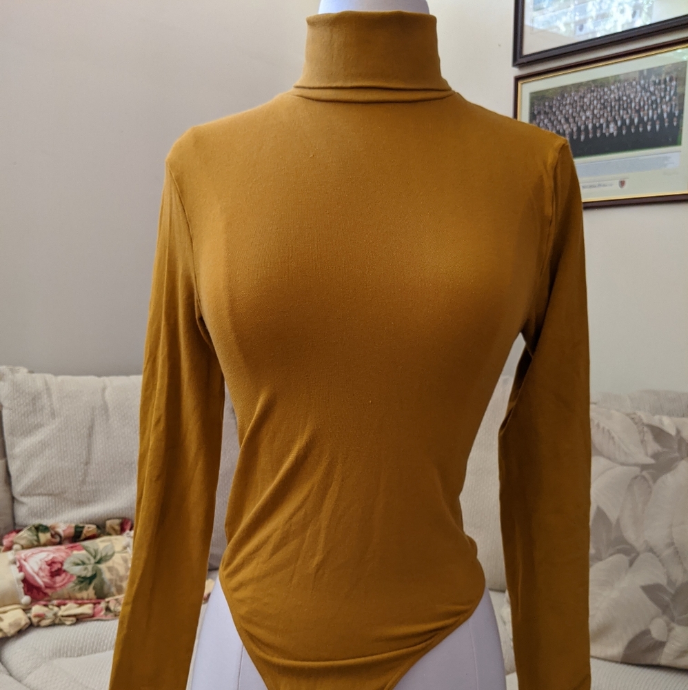 Mustard yellow turtleneck leotard top